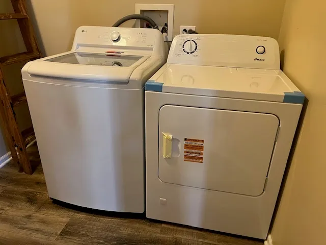 a utility room with dryer and washer