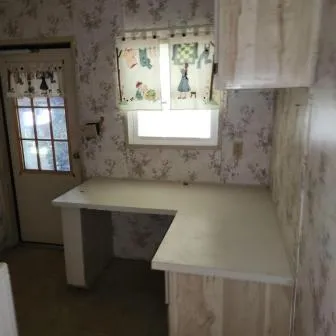 a view of kitchen with window