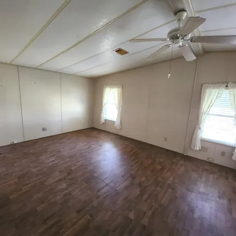 a view of living room and dining room