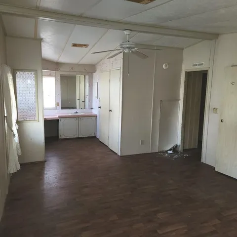 a utility room with a sink and a window