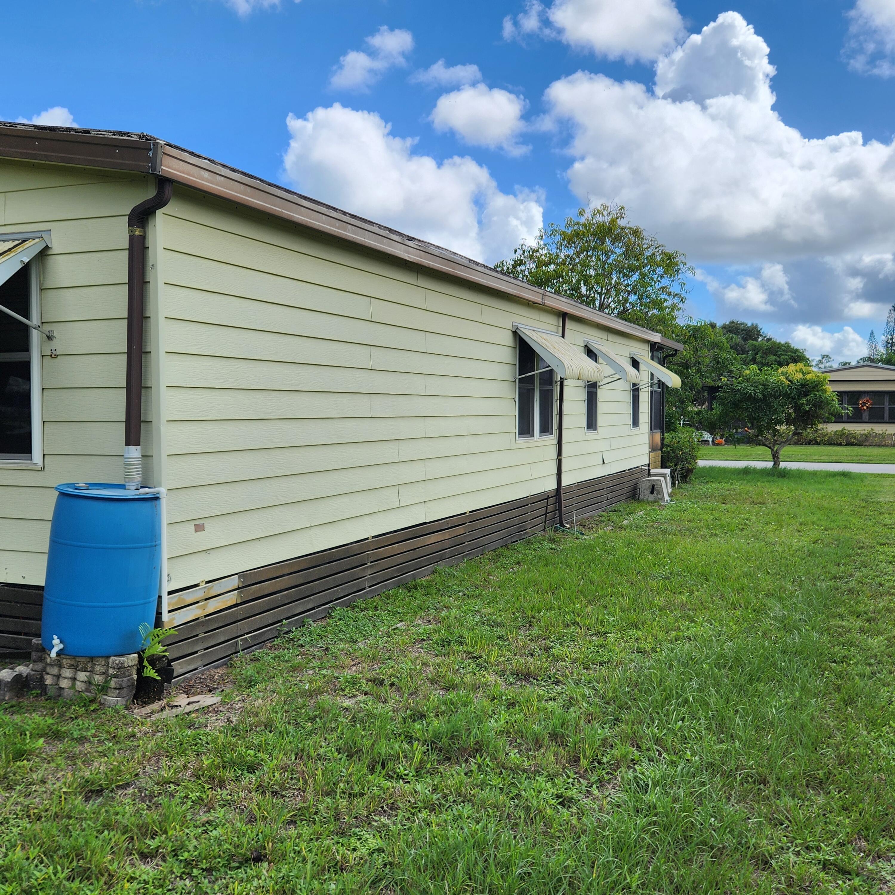 2847 Southwest Thunderbird Trail Stuart, FL 34997 - Photo 3 of 22 a view of a backyard