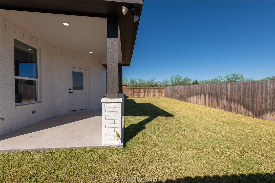 2908 GOLDBERG Drive Bryan, TX 77808 - Photo 41 of 44 Covered back porch off of the living area features covered porch, privacy wood fenced yard plus fully sodded yard and irrigation system.