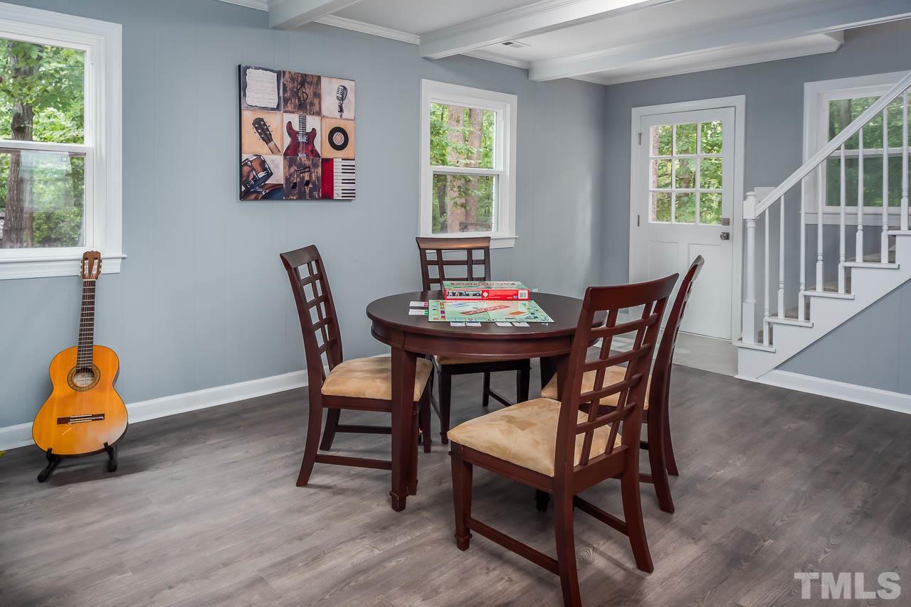 4008 Oak Park Road Raleigh, NC 27612 - Photo 15 of 24 a dining room with furniture and window