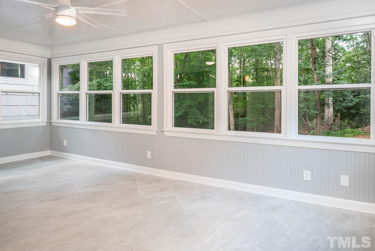 4008 Oak Park Road Raleigh, NC 27612 - Photo 6 of 24 a view of an empty room with a window
