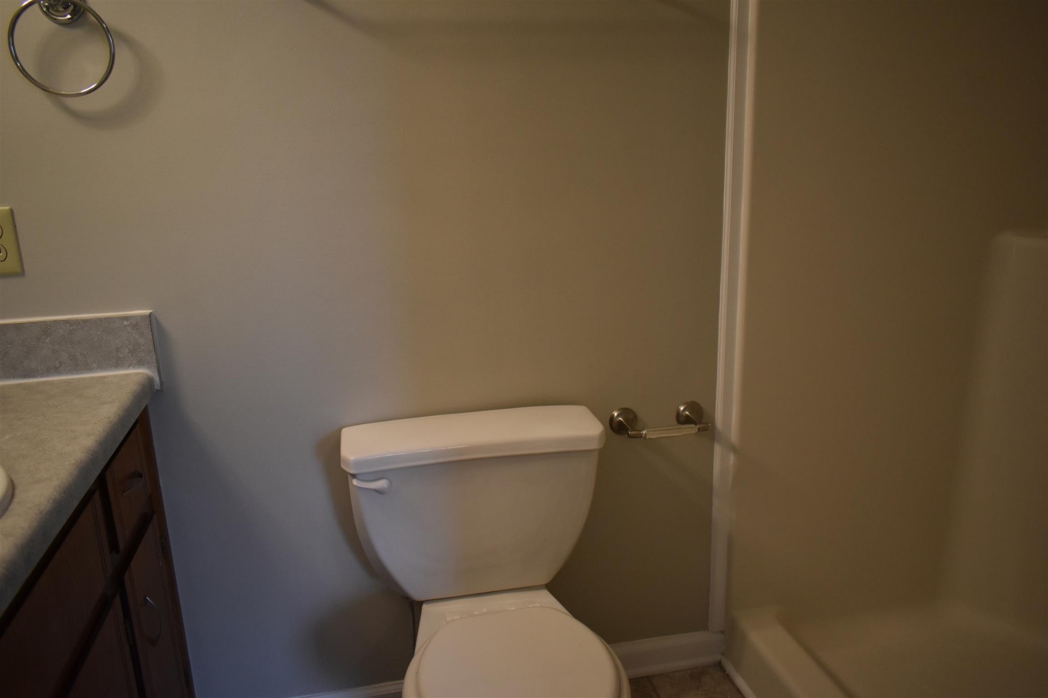 153 Monarch Lane Clarksville, TN 37042 - Photo 7 of 11 a toilet sitting in a bathroom next to a sink