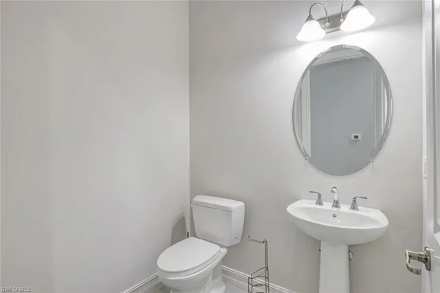 a bedroom with furniture and window