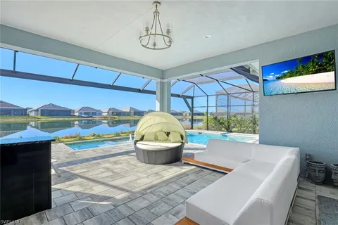 a view of a living room and floor to ceiling window