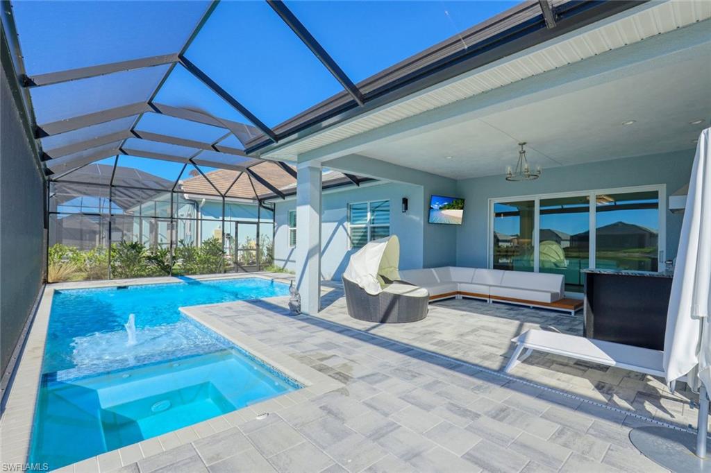 14327 Laguna Springs Lane Naples, FL 34114 - Photo 28 of 35 a view of a porch with furniture