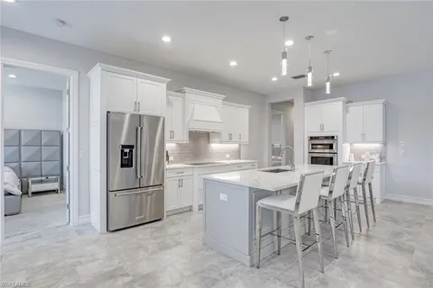 a view of a dining room with furniture and window