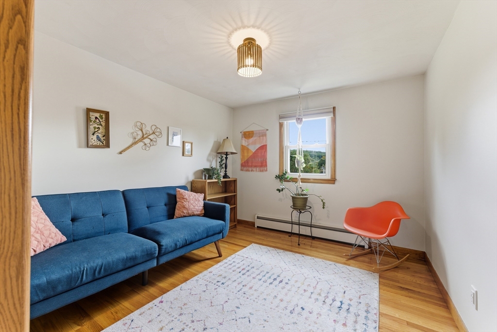 97 Mountain Road Holyoke, MA 01040 - Photo 13 of 27 a living room with furniture rug and window