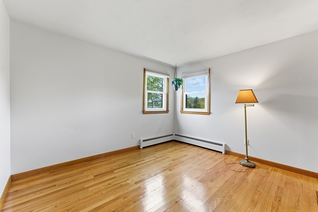97 Mountain Road Holyoke, MA 01040 - Photo 15 of 27 a view of a room with wooden floor and window