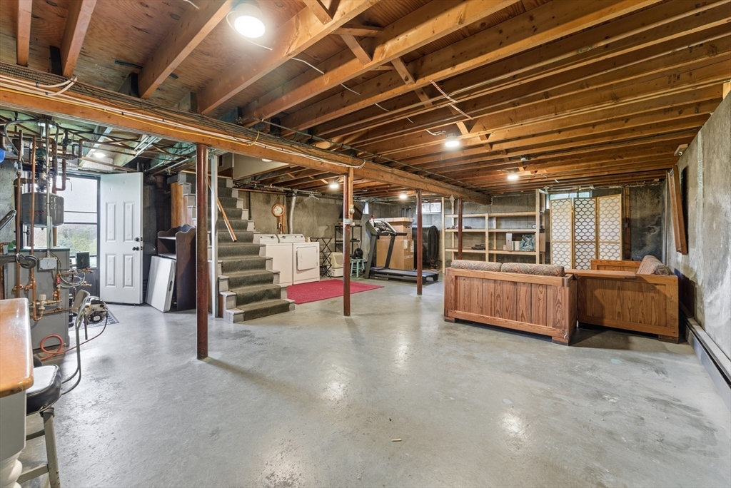 97 Mountain Road Holyoke, MA 01040 - Photo 19 of 27 a view of a garage room with wooden roof