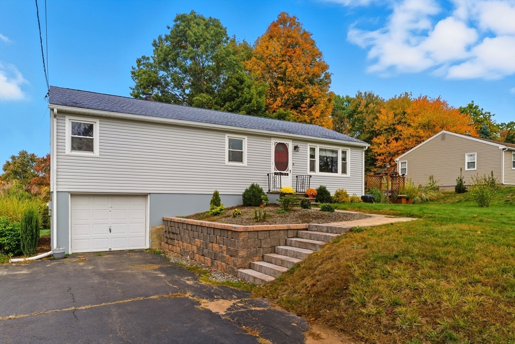 97 Mountain Road Holyoke, MA 01040 - Photo 4 of 27 a view of a house with backyard and trees