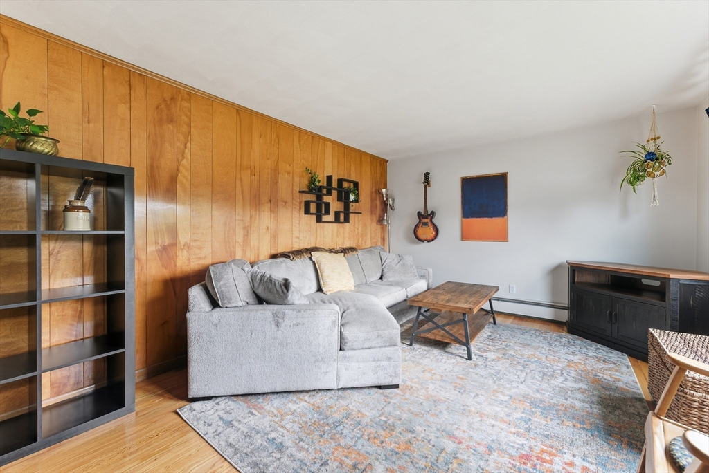 97 Mountain Road Holyoke, MA 01040 - Photo 5 of 27 a living room with furniture and wooden floor