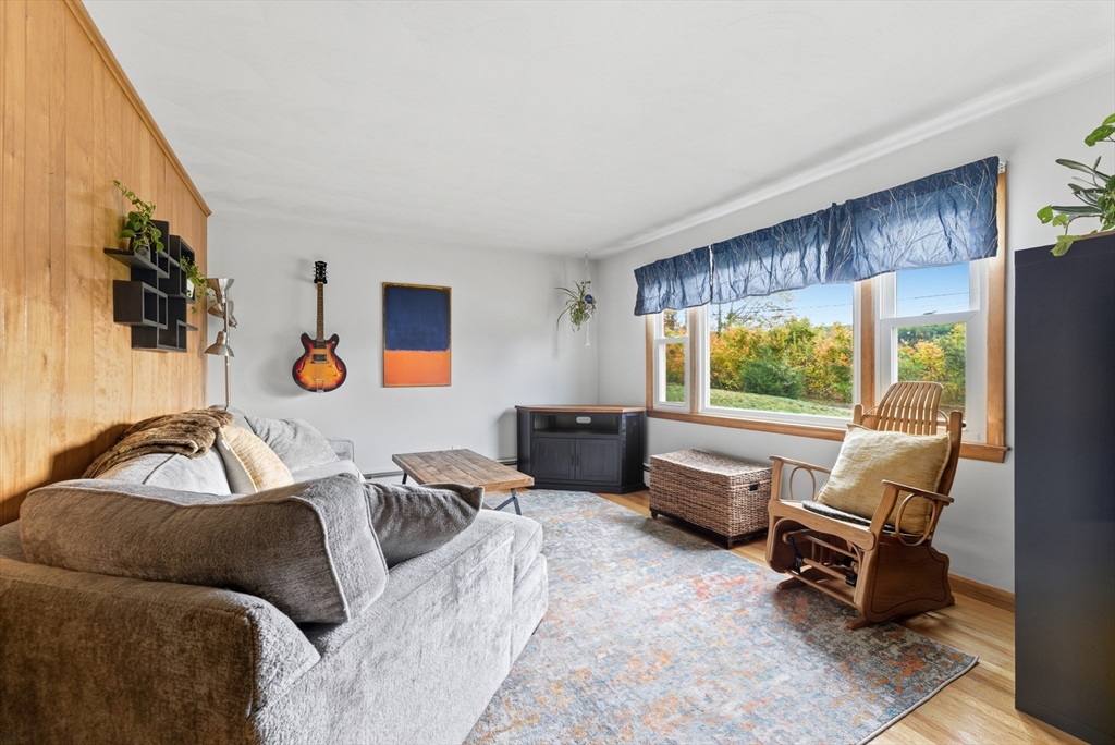97 Mountain Road Holyoke, MA 01040 - Photo 6 of 27 a living room with furniture and a large window