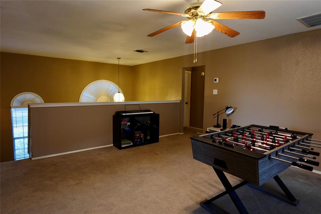 173 West Ranch Lane Weatherford, TX 76088 - Photo 15 of 29 a room with furniture and a fireplace