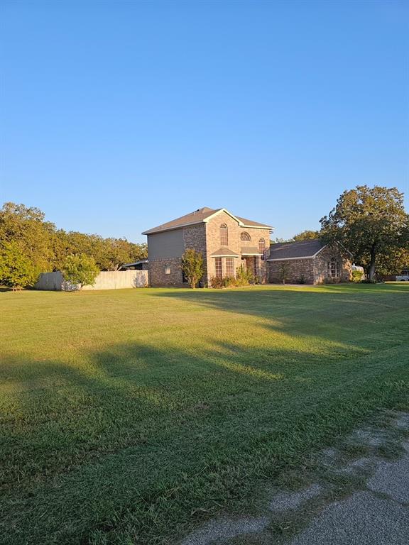 173 West Ranch Lane Weatherford, TX 76088 - Photo 26 of 29 a view of a house with a big yard