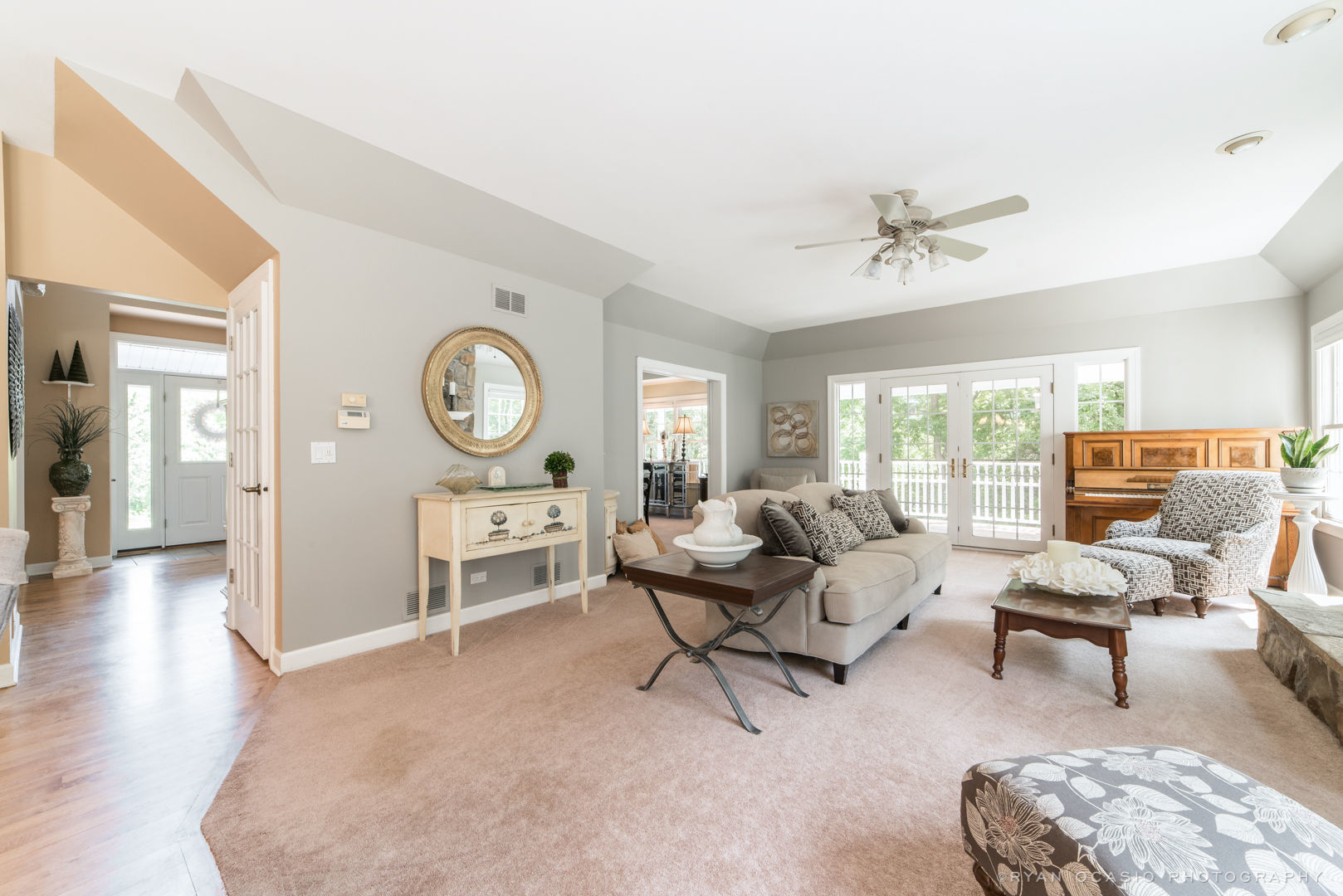 7N607 Stevens Road St. Charles, IL 60175 - Photo 14 of 37 a living room with furniture a clock and a large window