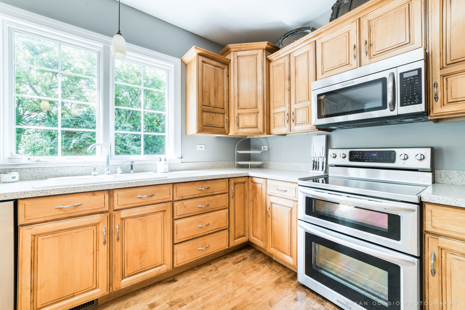 7N607 Stevens Road St. Charles, IL 60175 - Photo 18 of 37 a kitchen with granite countertop cabinets stainless steel appliances and a window