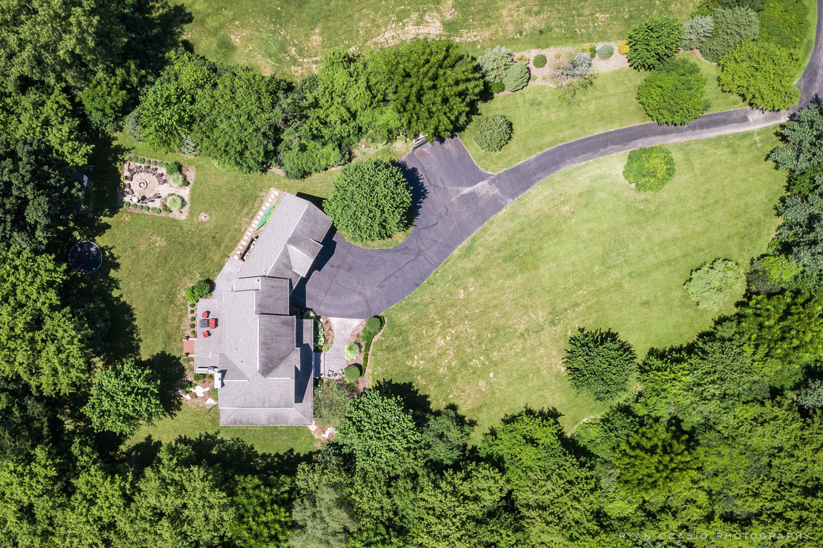 7N607 Stevens Road St. Charles, IL 60175 - Photo 4 of 37 an aerial view of a house with a yard and large trees