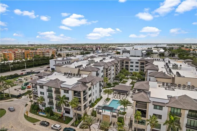 an aerial view of residential building with parking space