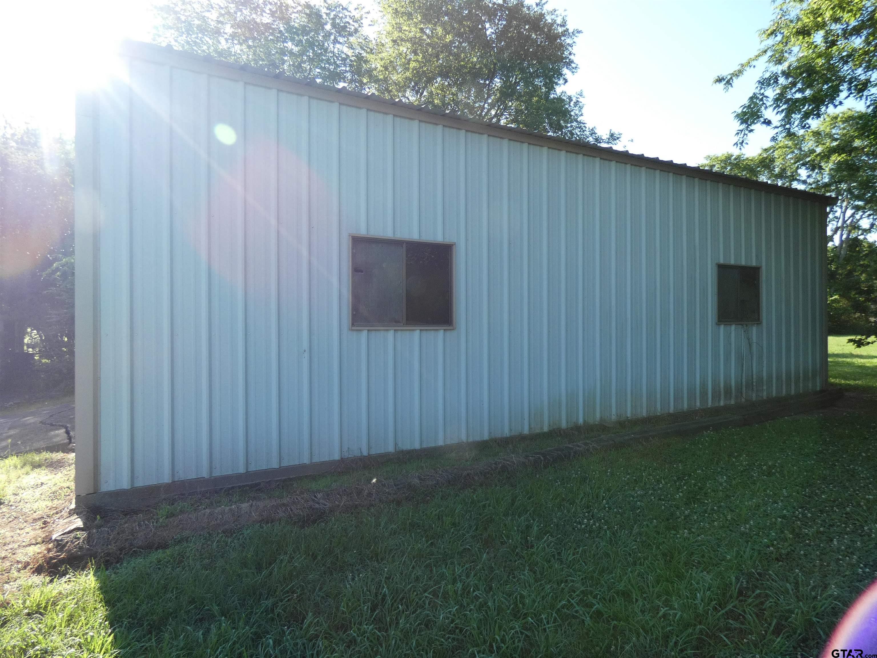 Tbd Tbd Wilson Talco, TX 75487 - Photo 2 of 8 a backyard view with hardwood wall