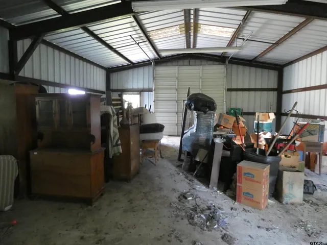 a close view of a refrigerator and a table in a room