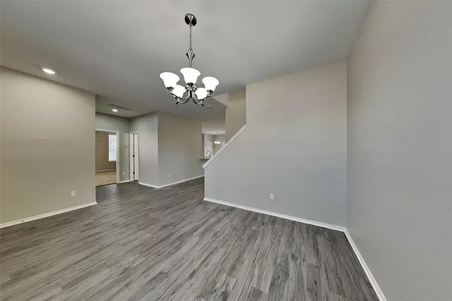 a view of a livingroom with wooden floor