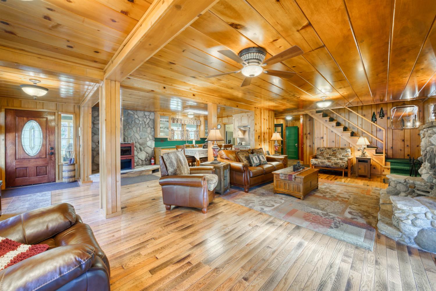 42025 Tollhouse Road Shaver Lake, CA 93664 - Photo 33 of 64 a living room with furniture and a wooden floor