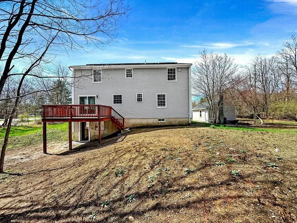 a view of a yard with a tree