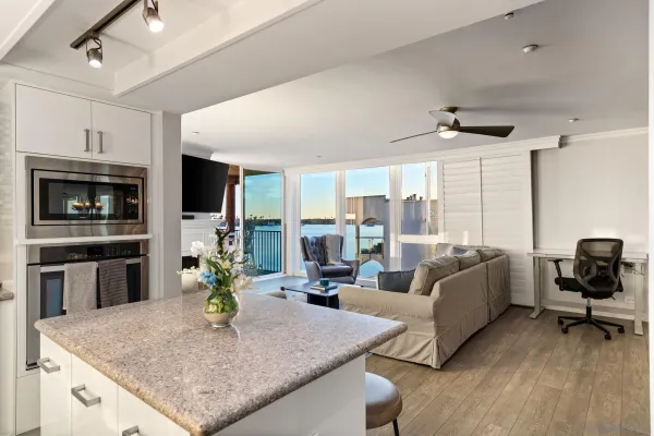 a living room with furniture fireplace and flat screen tv