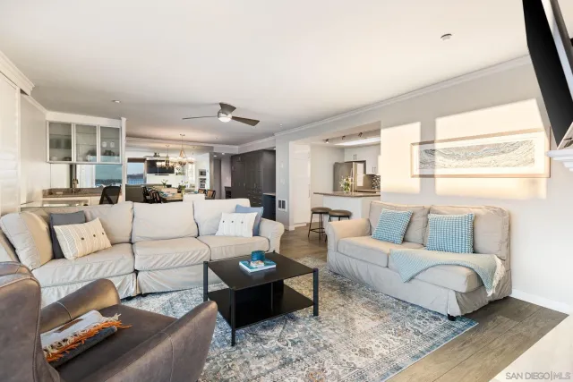 a work room with furniture and a window