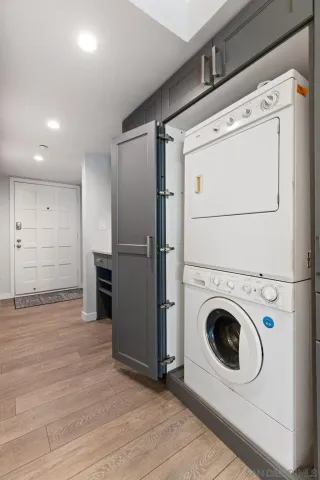 a view of a balcony with wooden floor