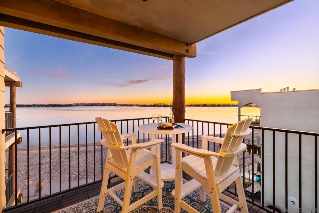 a view of a balcony with a ocean view