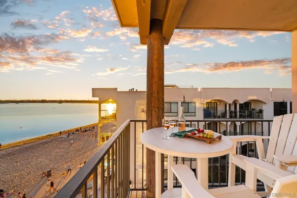 a balcony with a water view