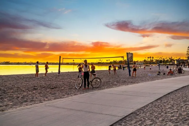 a view of a lake with a table and chairs