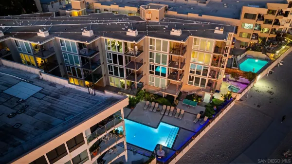 an outdoor space with lounge chair