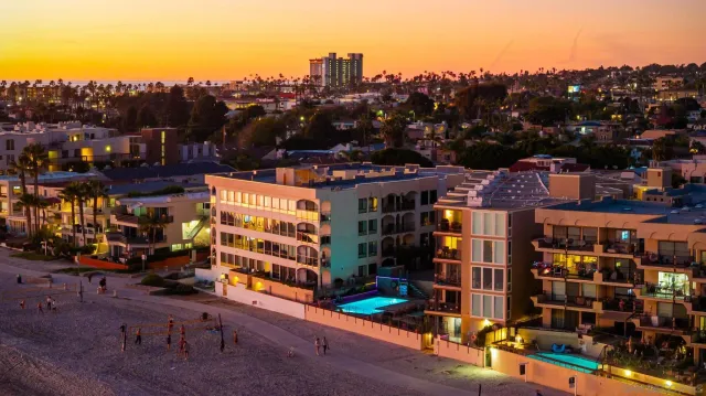 a view of a lake and tall building