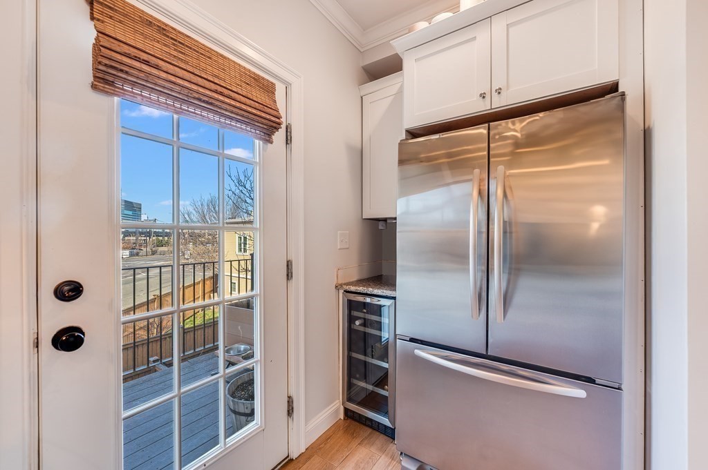 46 Rutherford Avenue Boston, MA 02129 - Photo 12 of 33 a refrigerator freezer sitting inside of a kitchen