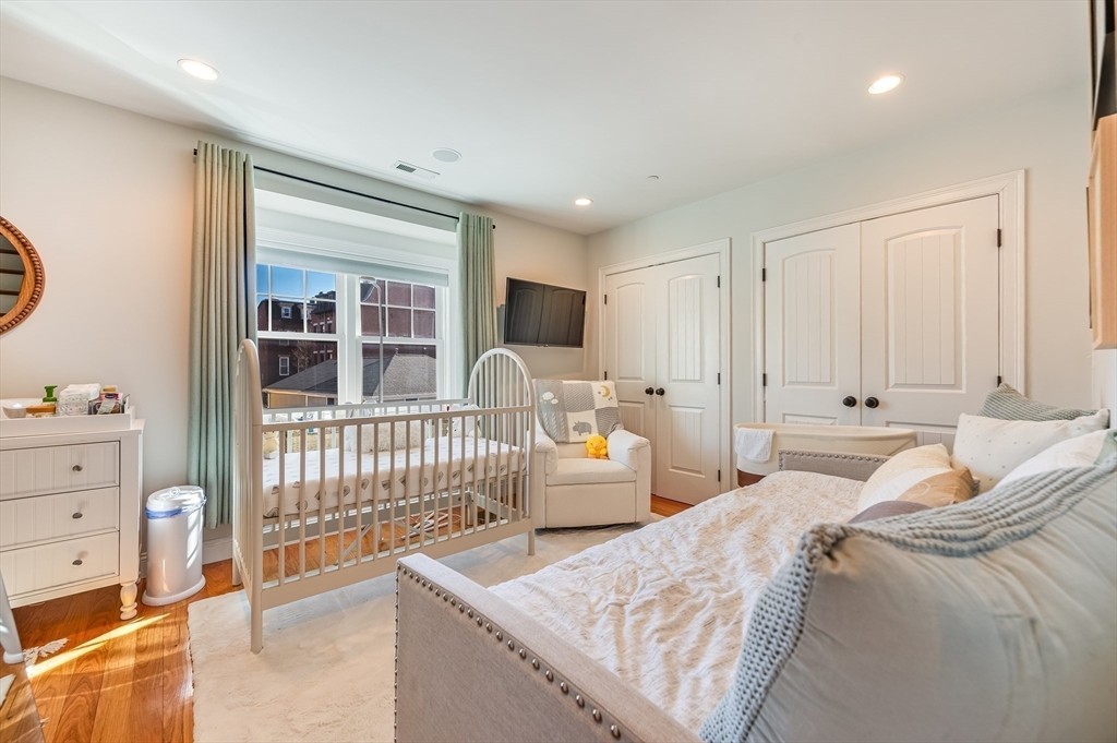 46 Rutherford Avenue Boston, MA 02129 - Photo 19 of 33 a bedroom with bed and window