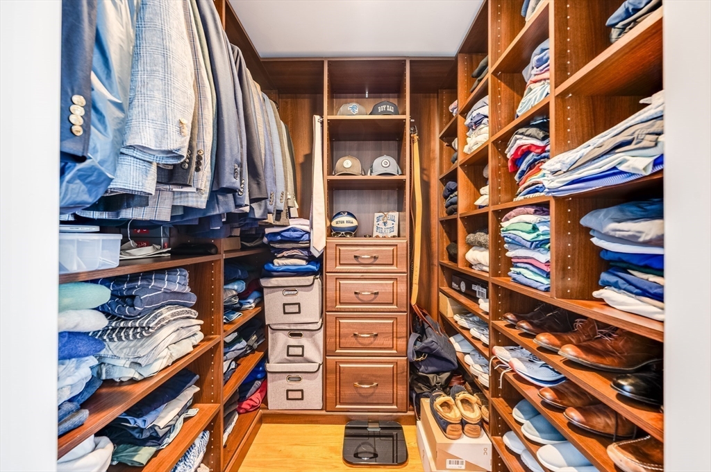 46 Rutherford Avenue Boston, MA 02129 - Photo 24 of 33 a view of walk in closet with clothes and shoes
