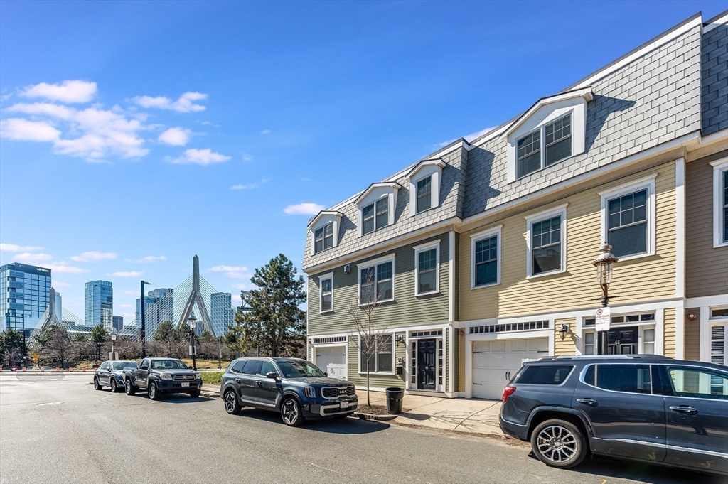 46 Rutherford Avenue Boston, MA 02129 - Photo 28 of 33 a car parked in front of a building