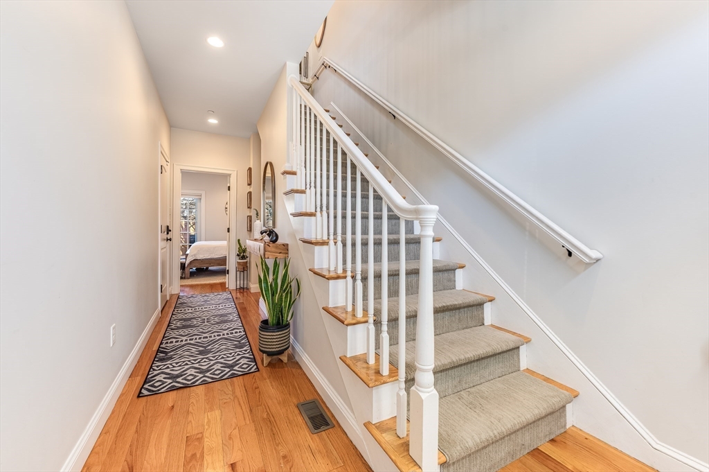 46 Rutherford Avenue Boston, MA 02129 - Photo 3 of 33 a view of entryway and hall with wooden floor