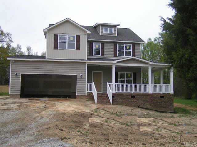 2430 Rolling Tracks Road Willow Spring, NC 27592 - Photo 1 of 10 Exterior Front