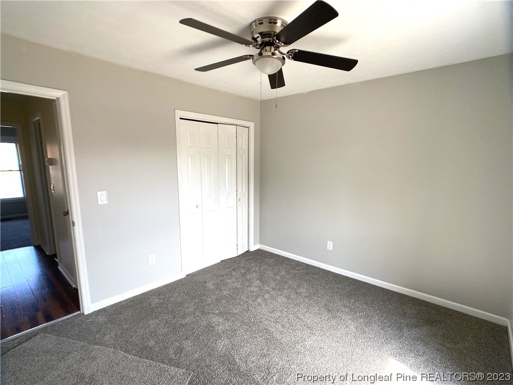 5686 Castleton Drive Hope Mills, NC 28348 - Photo 16 of 21 an empty room with windows and fan