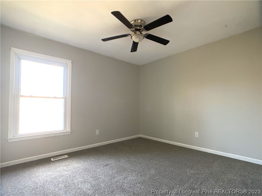 5686 Castleton Drive Hope Mills, NC 28348 - Photo 18 of 21 an empty room with a window