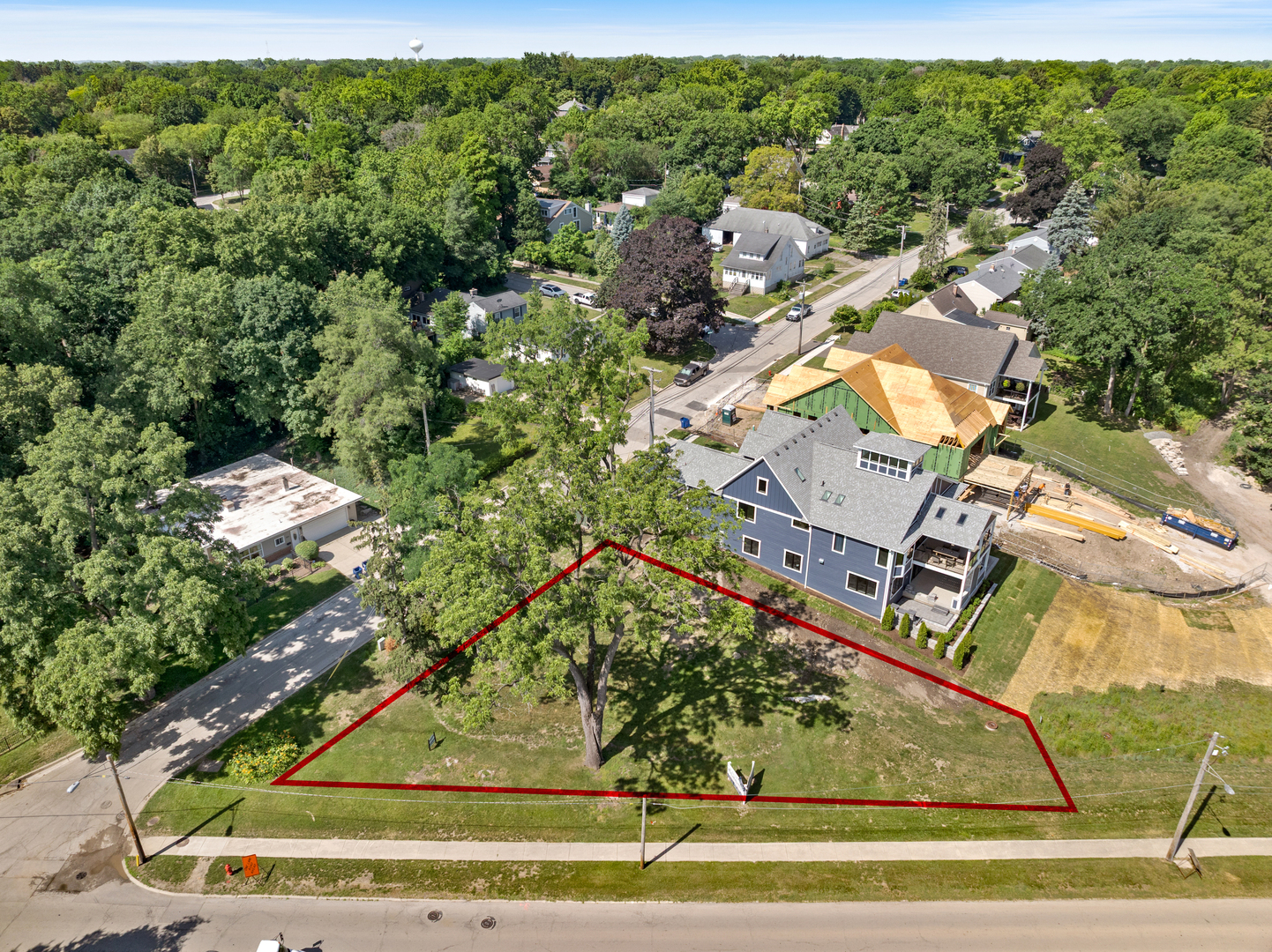 16 Mosedale Street St. Charles, IL 60174 - Photo 3 of 7 an aerial view of residential houses with outdoor space and trees
