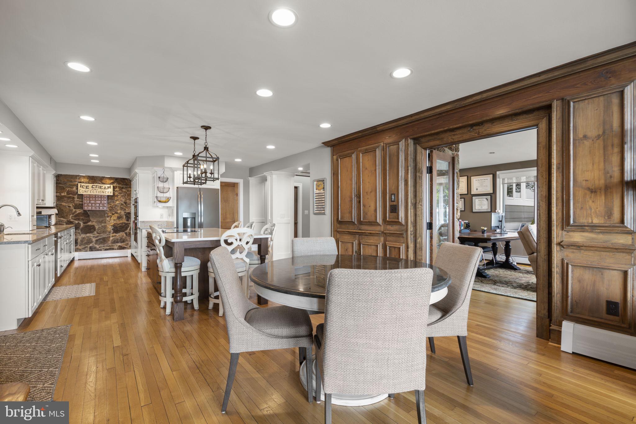 674 Hendler Road Severna Park, MD 21146 - Photo 14 of 48 a view of a dining room with furniture window and wooden floor