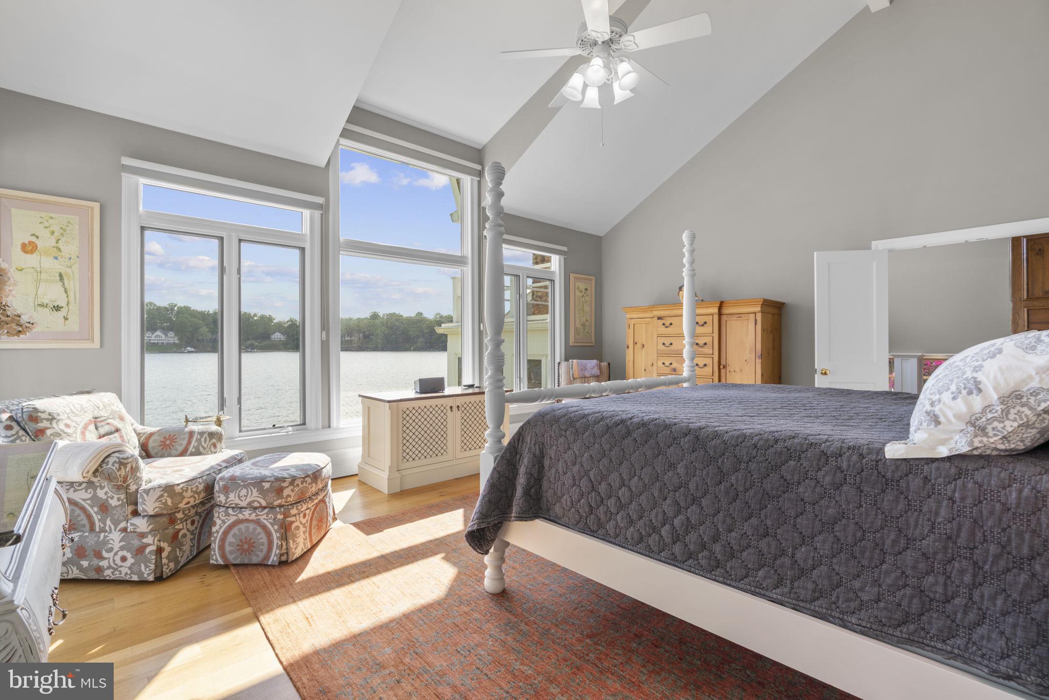 674 Hendler Road Severna Park, MD 21146 - Photo 22 of 48 a bedroom with a large bed and a large window