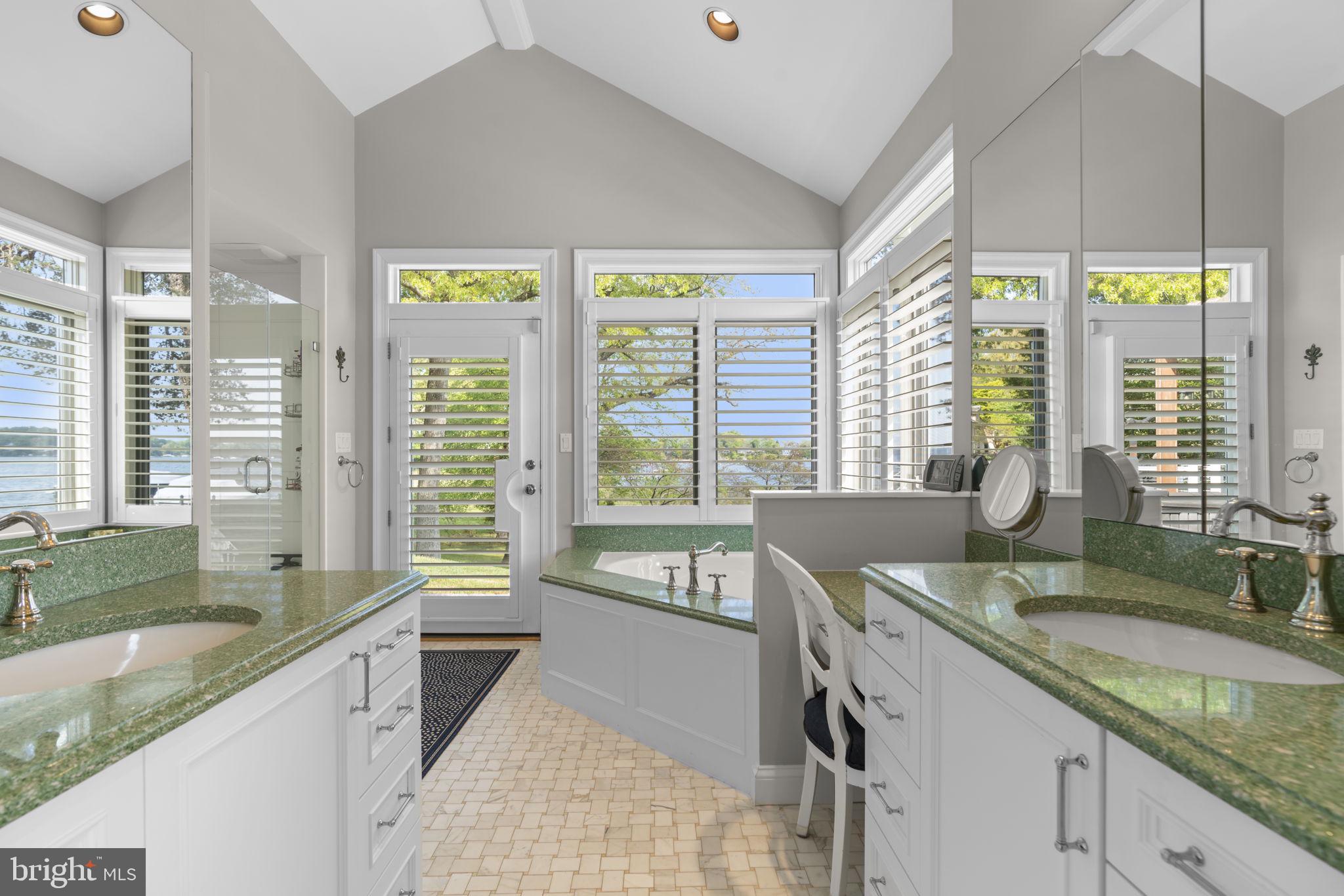 674 Hendler Road Severna Park, MD 21146 - Photo 23 of 48 a spacious bathroom with a granite countertop sink and a large window